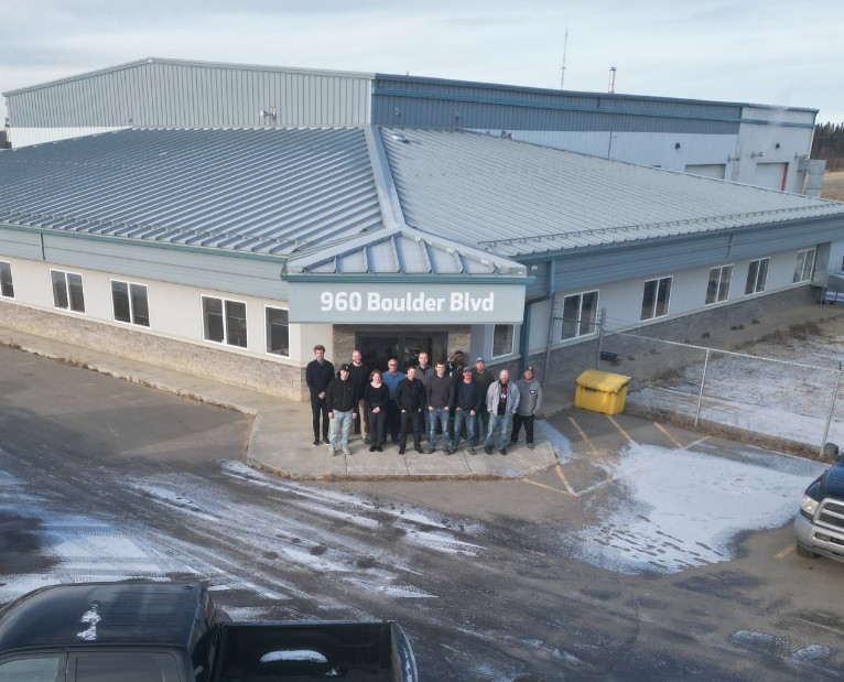 a group of people standing in front of a building